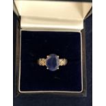 SILVER MARKED BLUE STONE WITH DIAMOND SET SHOULDERS SIZE O