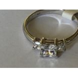 A 9 CARAT WHITE GOLD RING WITH CUBIC ZIRCONIA STONES - WEIGHT 2.1 GRAMS, RING SIZE O