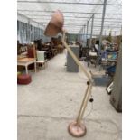 A LARGE FLOOR LAMP IN THE FORM OF AN ANGLE POISE LAMP WITH A COPPER SHADE AND BASE - WORKING ORDER