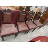 FOUR CARVED MAHOGANY DINING CHAIRS
