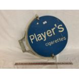 A VINTAGE METAL 'PLAYER'S CIGARETTES' CIRCULAR ADVERTISING SIGN ON A BRACKET