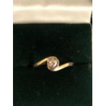 9CT DIAMOND SOLITAIRE TWIST RING SIZE N