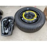 A 185/60R15 SPARE WHEEL AND WHEEL CHANGING TOOLS