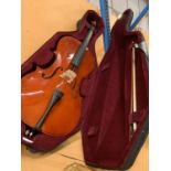 A CASED CELLO WITH BOW IN GOOD CONDITION