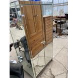 A MIRRORED WARDROBE WITH TWO DOORS