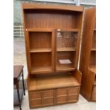 A RETRO TEAK CABINET WITH TWO LOWER AND TWO UPPER DOORS (ONE REQUIRES GLASS)