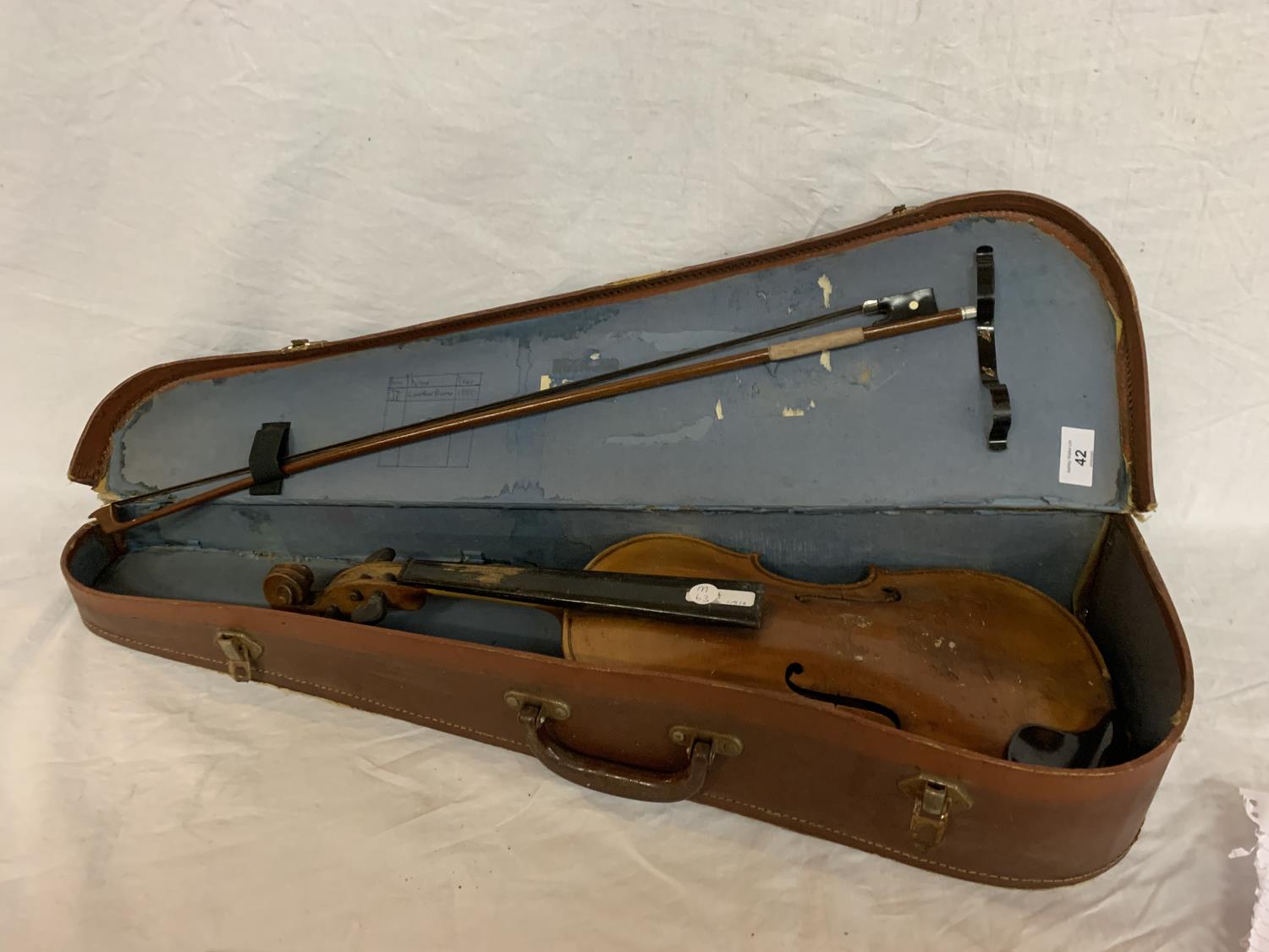 A CASED VIOLIN WITH BOW NO STRINGS