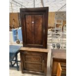 A GEORGIAN OAK LARDER CUPBOARD WITH ONE LOWER AND ONE UPPER DOOR