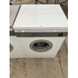 A ZANUSSI DRYER TD100, FAIRLY CLEAN, IN WORKING ORDER