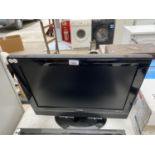 A TECHNIKA TELEVISION 22" WITH BUILT IN DVD PLAYER, NO LEAD OR REMOTE, IN WORKING ORDER