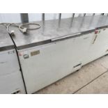 A LARGE SHOP CHEST FREEZER, NEEDS A CLEAN, SLIGHT DAMAGE TO OUTER PLASTIC CASING BUT DOES NOT AFFECT