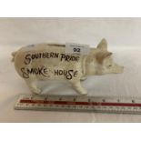 A CAST BUTCHERS PIG MONEY BOX 'SOUTHERN PRIDE SMOKEHOUSE'