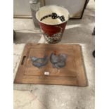 A METAL BUCKET WITH DALMATIAN DECORATION AND A BREAD BOARD WITH BARRED ROCK BANTAM DECORATION