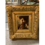 A SQUARE HEAVY GILT FRAMED PRINT OF A LADY