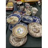 A LARGE COLLECTION OF CERAMICS TO INCLUDE PLATES, BLUE AND WHITE WARE, JUGS ETC.