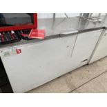 A LARGE SHOP CHEST FREEZER, NEEDS A CLEAN, IN WORKING ORDER