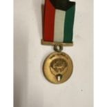 A LIBERATION OF KUWAIT MEDAL AND RIBBON