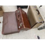 THREE VINTAGE SUITCASES