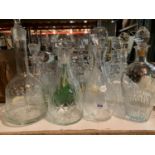 FIFTEEN GLASS DECANTERS