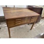 AN OAK PLAN CHEST WITH THREE DRAWERS