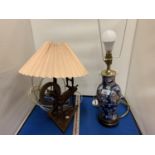 A VINTAGE OAK SPINNING WHEEL LAMP AND A FURTHER CERAMIC EXAMPLE