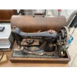 A SINGER SEWING MACHINE Y6380709 WITH CASE