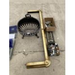 A CAST IRON FIRE GRATE, BRASS FIRE SURROUND AND A QUANTITY OF DOOR KNOBS AND HANDLES