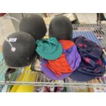 THREE RIDING SKULL CAPS AND VARIOUS JOCKEY SILKS