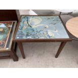 A SMALL MAHOGANY TABLE WITH SWAN TAPESTRY TOP