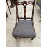 A VICTORIAN INLAID MAHOGANY NURSING CHAIR