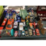 A LARGE COLLECTION OF TOYS TO INCLUDE DALEKS, TRACTORS, CARS, HELICOPTERS ETC.
