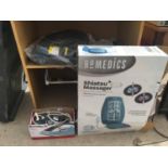 A HOMEDICS SHIATSU MASSAGER TOGETHER WITH A BREVILLE STEAM IRON