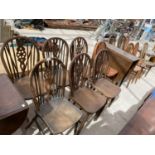 THIRTEEN VARIOUS OAK WHEELBACK CHAIRS