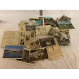 A LARGE COLLECTION OF VINTAGE POST CARDS AND CIGARETTE CARDS