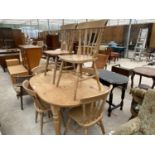 A PINE DINING TABLE AND SIX PINE DINING CHAIRS