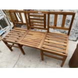 A THREE SEATER TEAK GARDEN BENCH