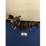 THREE BESWICK GLOSS BAY FOAL FIGURES, TWO STANDING AND ONE RECUMBENT. TALLEST FIGURE 11 CM