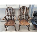 TWO STRAWBERRY HILL YEW WOOD WINDSOR ARMCHAIRS IN THE GOTHIC STYLE WITH ELM SEATS, AND CRINOLINE