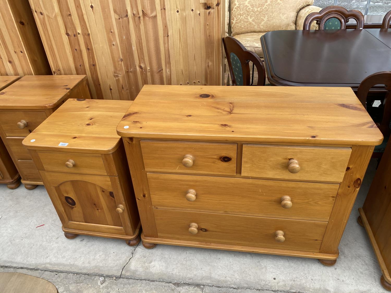 A PINE BEDSIDE CABINET AND A PINE CHEST OF TWO SHORT AND TWO LONG DRAWERS