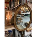 TWO MIRRORS TO INCLUDE AN ORNATE WALL MIRROR AND A FREE STAND RECTANGULAR MIRROR