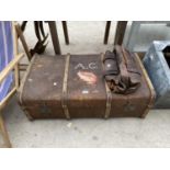 A WOOD BOUND TRAVEL TRUNK AND A VINTAGE LEATHER GLADSTONE BAG