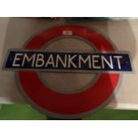 AN EMBANKMENT METAL SIGN