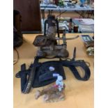 THREE VINTAGE ITEMS TO INCLUDE A TILLEY LAMP, HEAVY HORSE BLINKERS, SCALES (NO PAN) AND A CAMEL