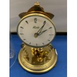 A VINTAGE KIENINGER & OBERGFELL KUNDO CLOCK