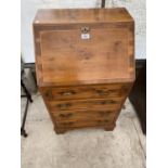 A SMALL BEVAN AND FUNNEL YEW WOOD BUREAU WITH FALL FRONT, FOUR DRAWERS AND GREEN LEATHER WRITING