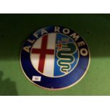 A CIRCULAR ALFA ROMEO ADVERTISING SIGN