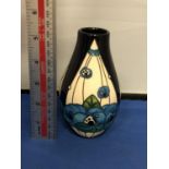 A MOORCROFT RED ROSE BLUE AND CREAM VASE, 13.5 CM