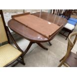 AN ARIGHI BIANCHI REGENCY STYLE MAHOGANY DINING TABLE