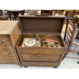 A VINTAGE REGENTONE RADIOGRAM WITH RECORD DECK