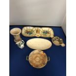 A QUANTITY OF CHARLOTTE RHEAD CROWN DUCAL DISHES AND SMALL VASES ETC